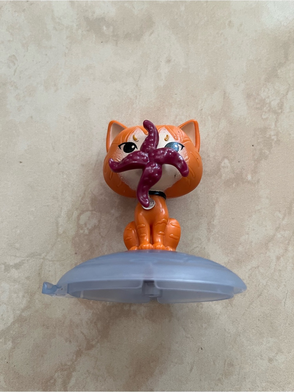 McDonald's Orange Cat Figure with Purple Starfish